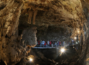 A group of tourists walking through the Rudicky Propadan