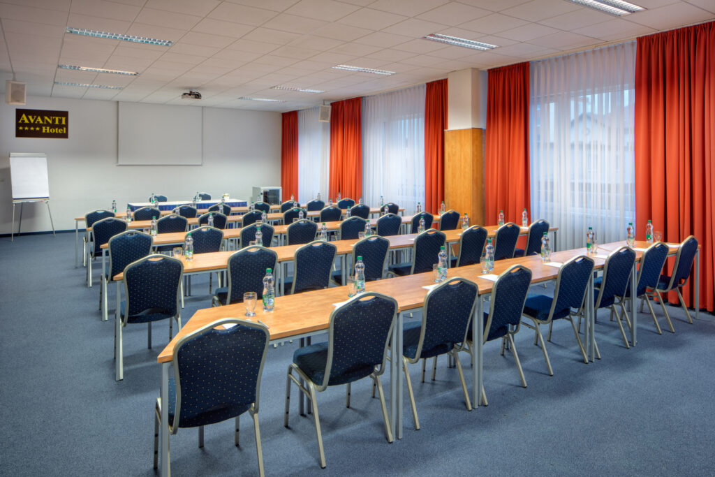 A conference room at the Avanti hotel with school-style meeting arrangements