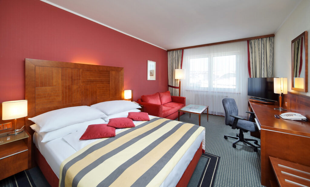 A room in the Quality Hotel with a red wall