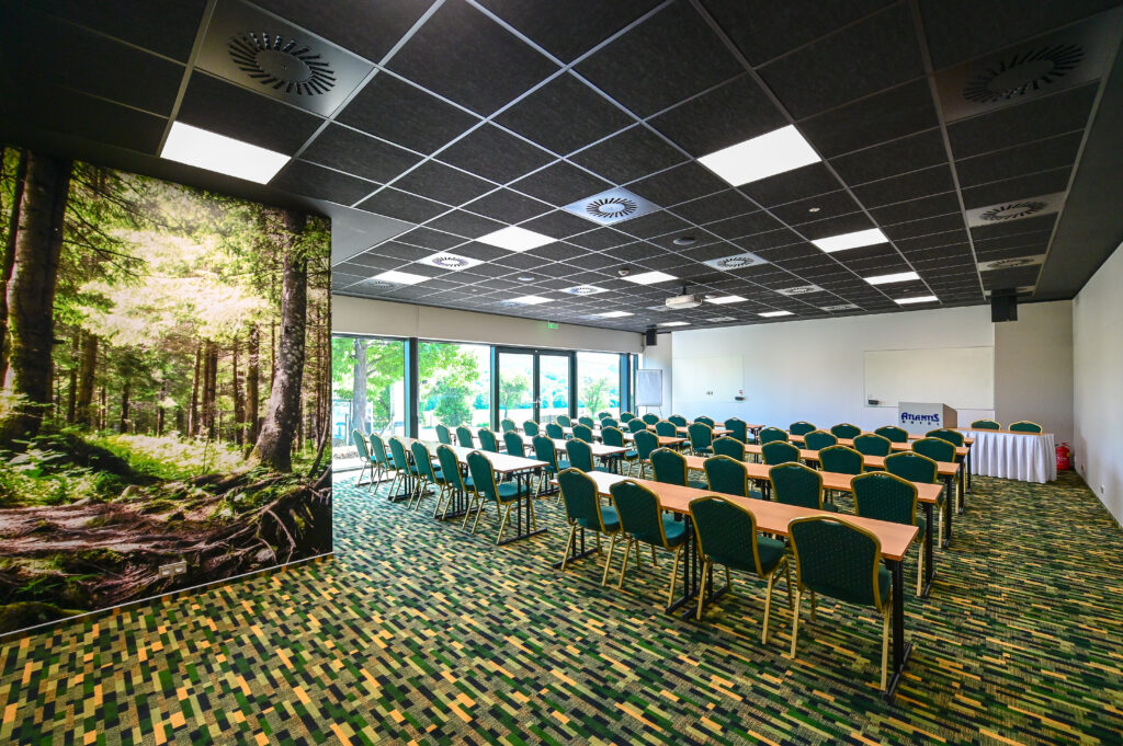 A conference room with school-style meeting arrangements