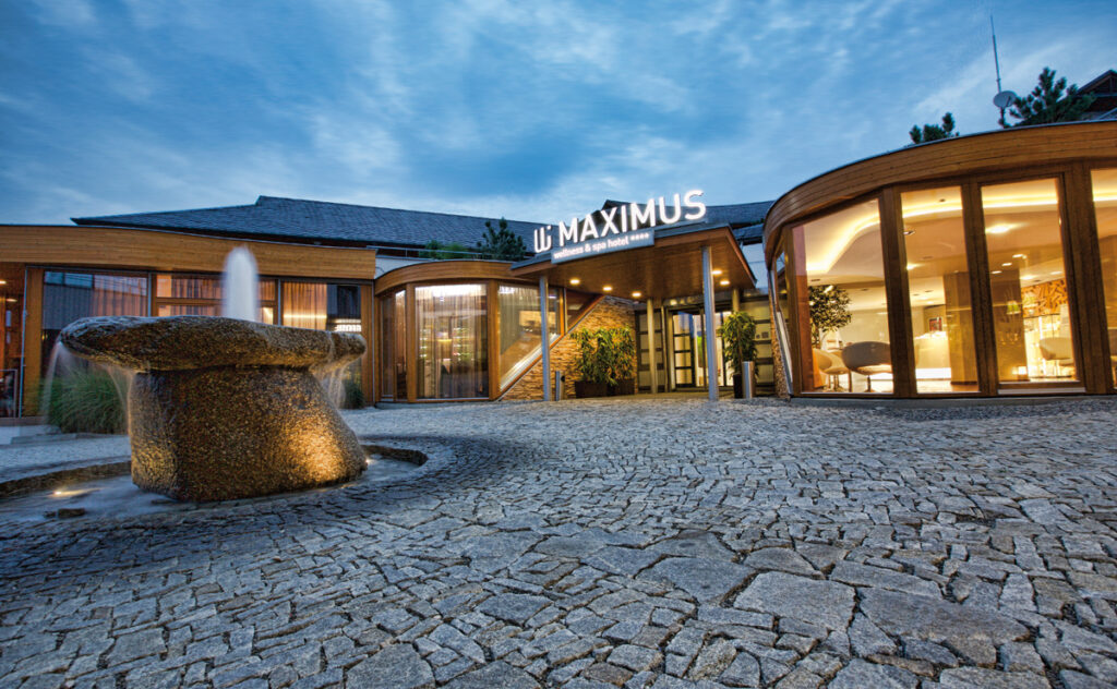 The main entrance of the Maximus resort in the evening with lighting